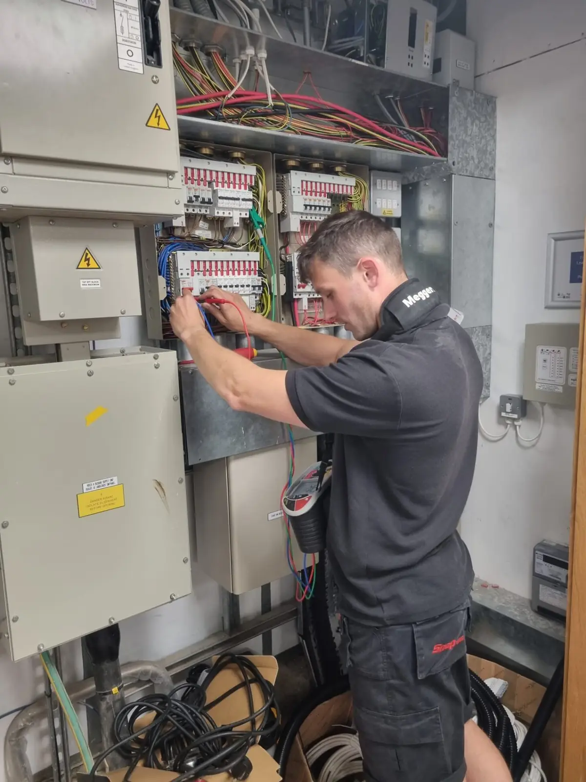 Commercial three-phase distribution board EICR testing in Wakefield