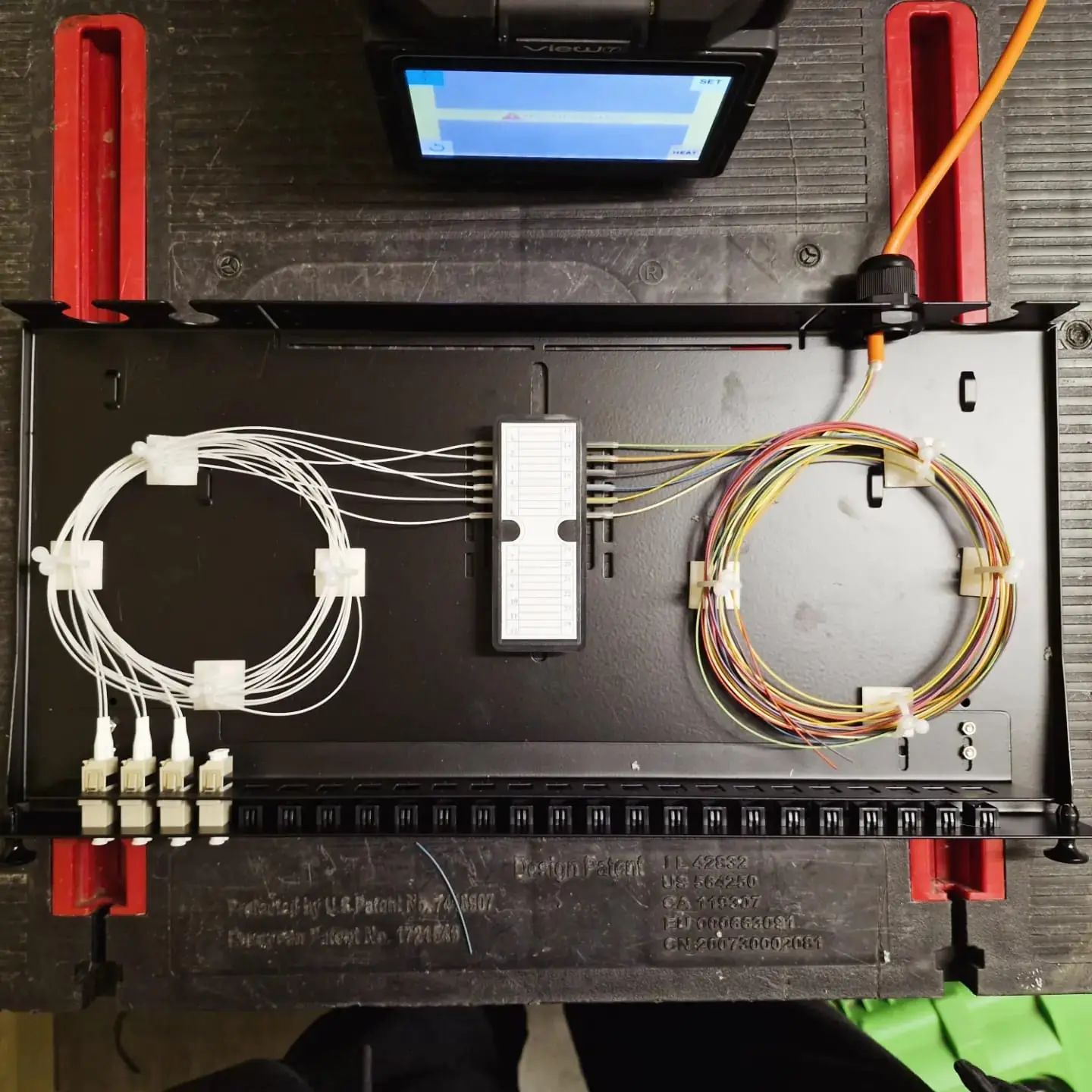 Fibre optic splicing tray with terminated pigtails in Wakefield